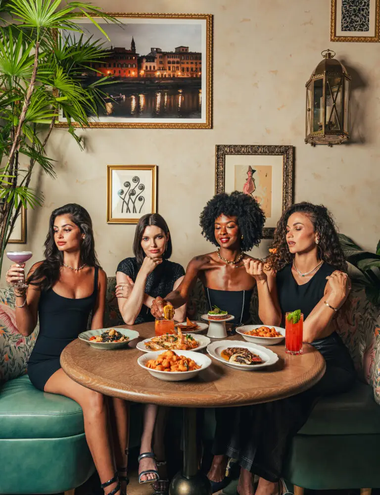 a group of girls enjoying meal at Casadonna